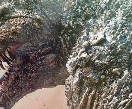 Godzilla looking back in a cropped promotional photo from Godzilla Minus One