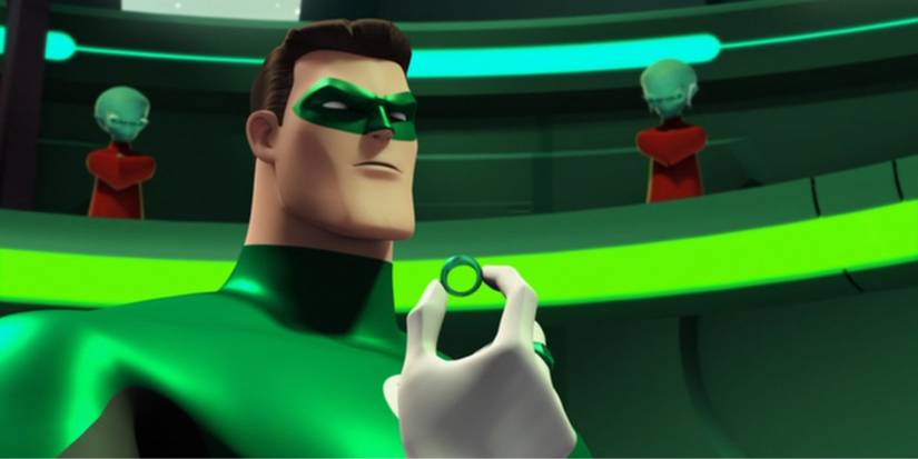 Hal Jordan holding a ring and looking up in the show Green Lantern The Animated Series