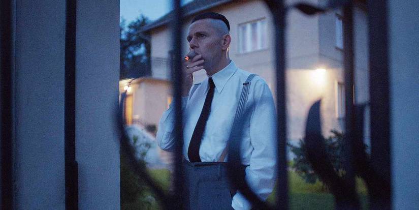 Christian Friedel as Rudolf Höss smoking a cigarette in 'The Zone of Interest'