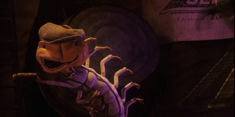 Mr. Centipede holding a cigar