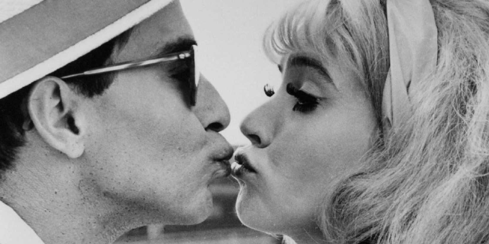 Jean-Luc Godard and Anna Karina almost kissing in Cléo From 5 to 7