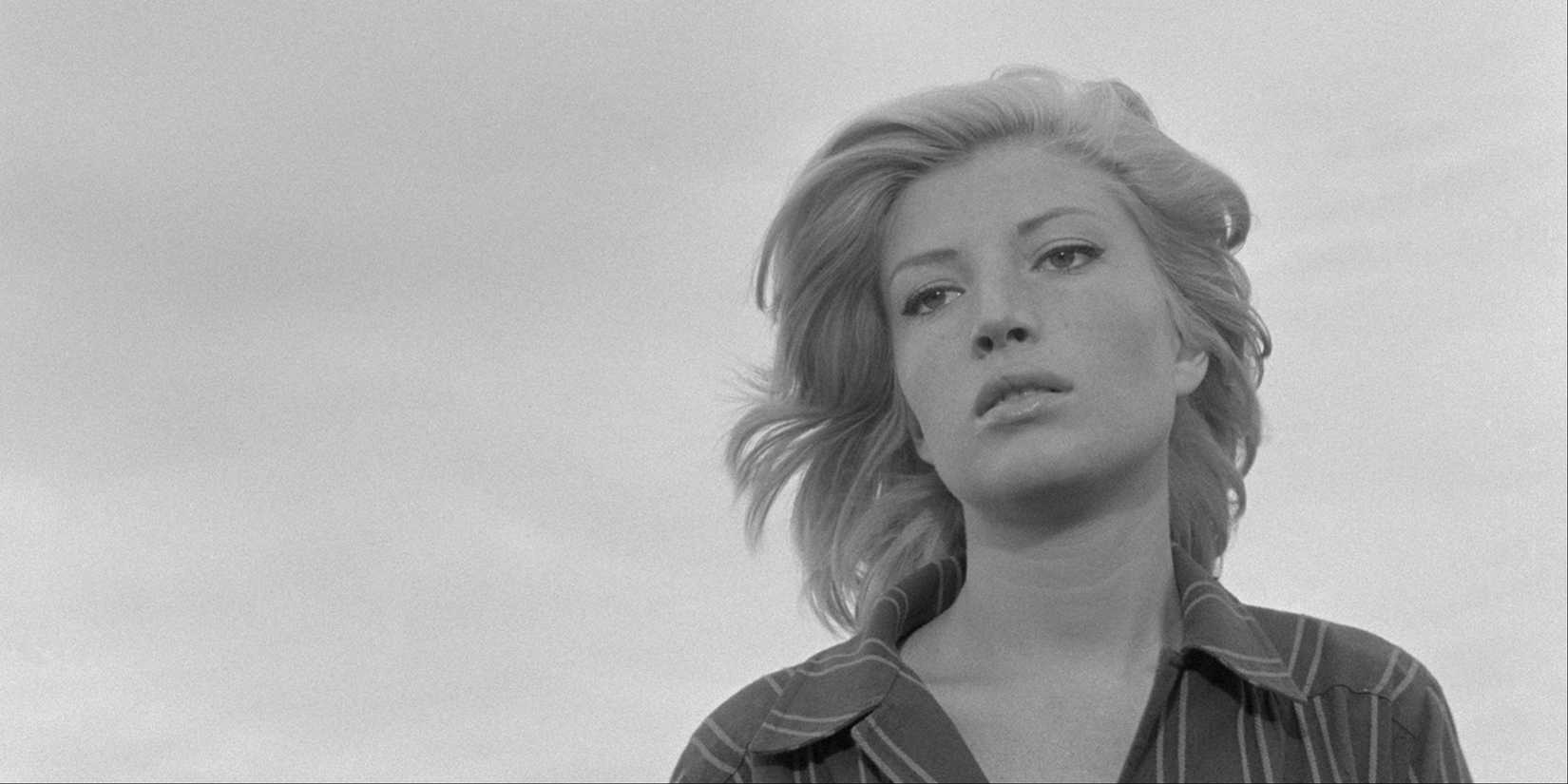 Monica Vitti looking toward the camera in L'Avventura