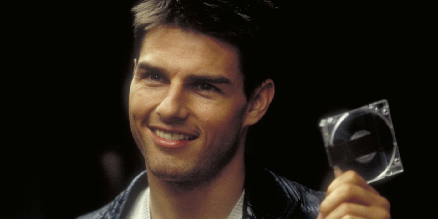 Tom Cruise holding a disc in Mission: Impossible