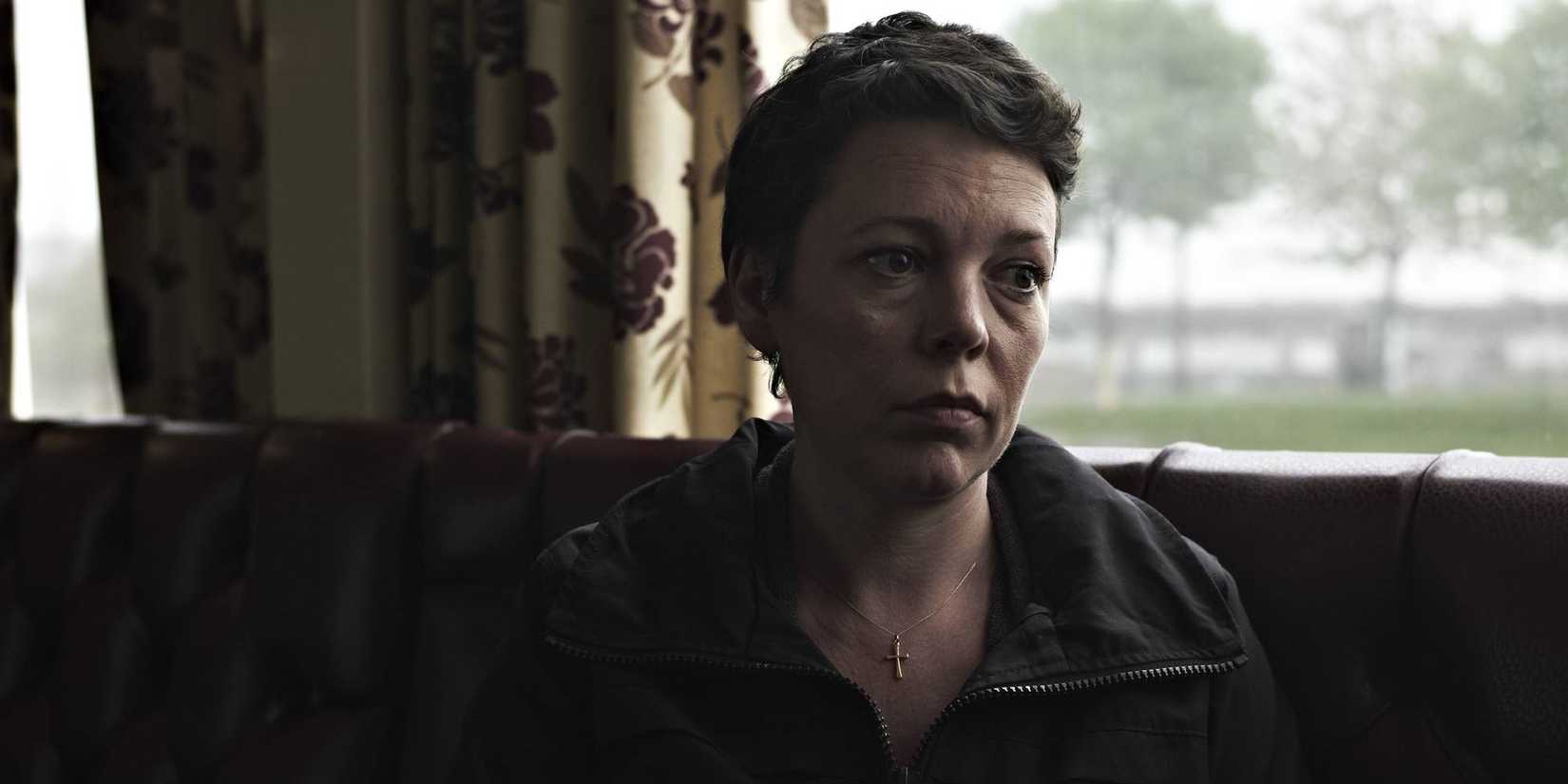 Olivia Colman with a saddened expression in Tyrannosaurus