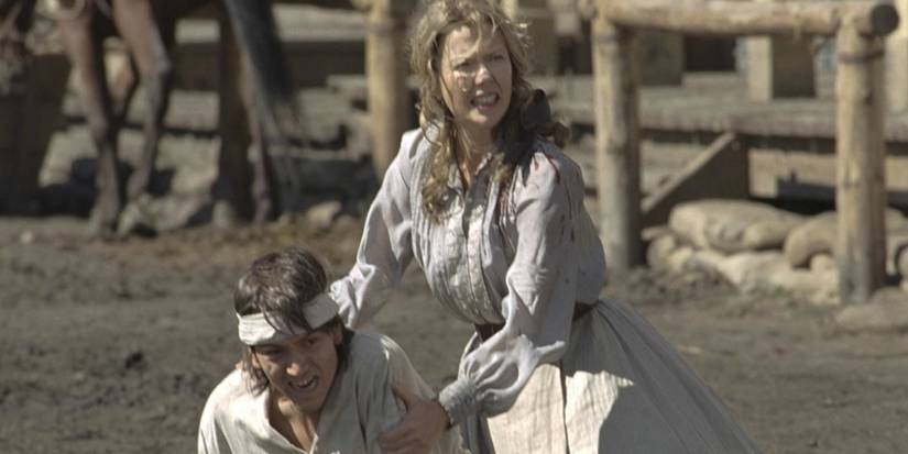 Annette Bening and Diego Luna in Open Range