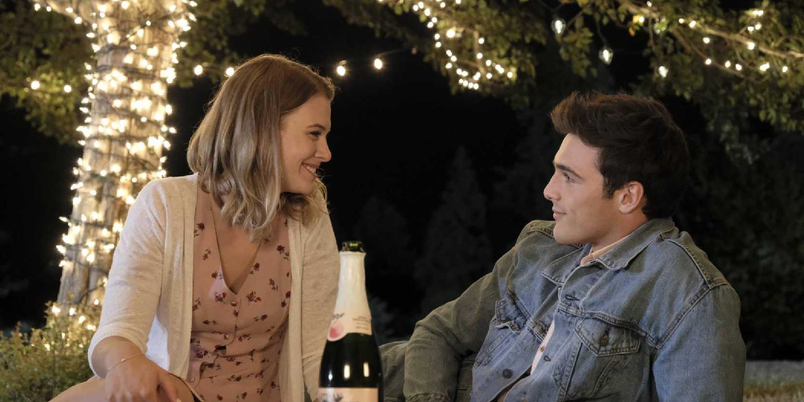 Radha Mitchell and Jacob Elordi looking at each other while having a conversation in 2 Hearts