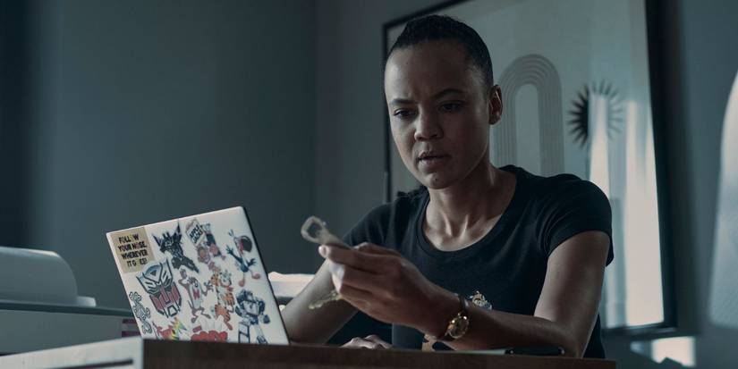 Frances Neagley (Maria Sten) examining a key in Reacher Season 2.