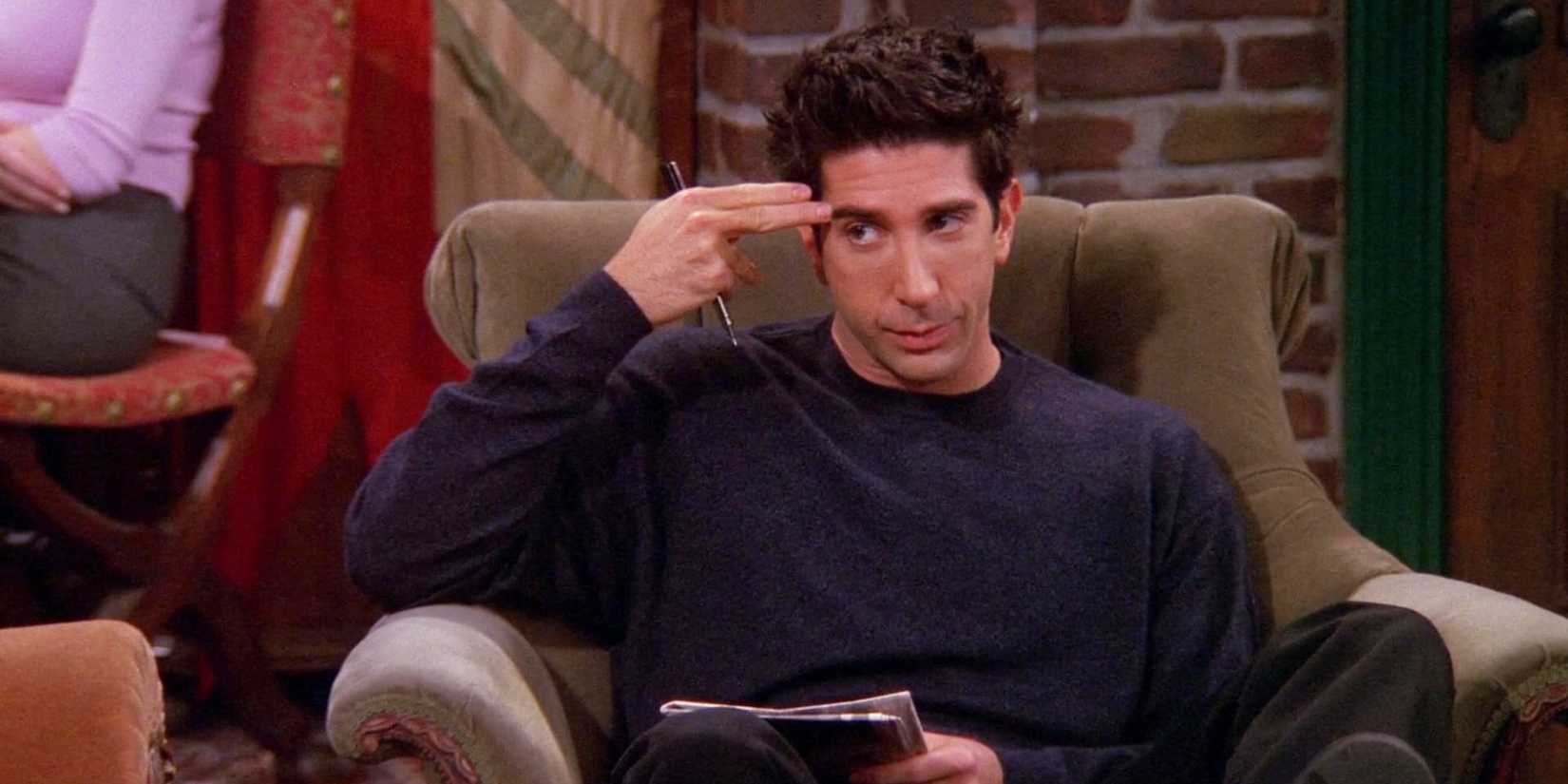 Ross (David Schwimmer) holding his fingers to his head, explaining Unagi on Friends