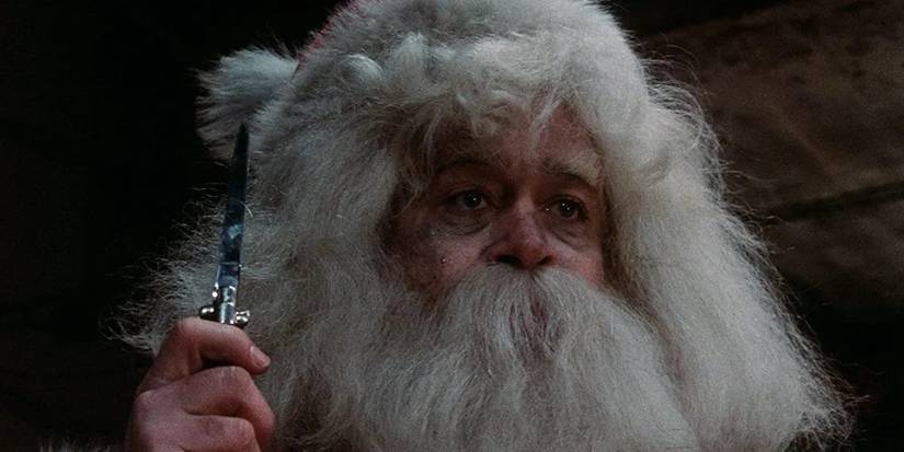 Brandon Maggart as Harry Stadling holding a knife in 'Christmas Evil'