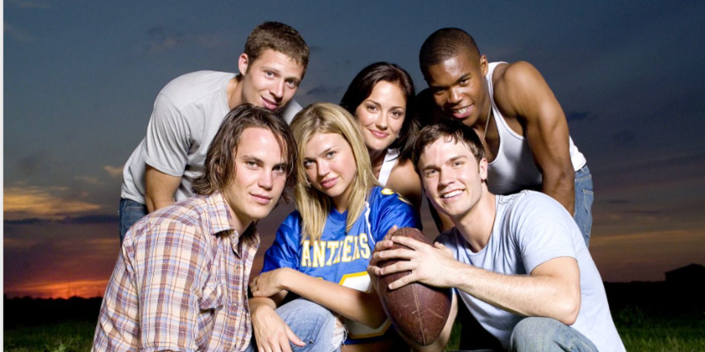 The Cast of Friday Night Lights Posing On Field 