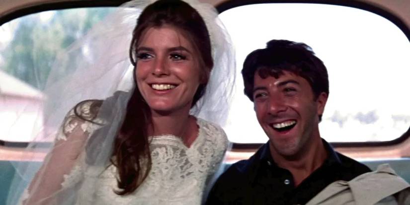 Katherine Ross and Dustin Hoffman as Elaine and Benjamin laugh in the back of a bus in The Graduate (1967).