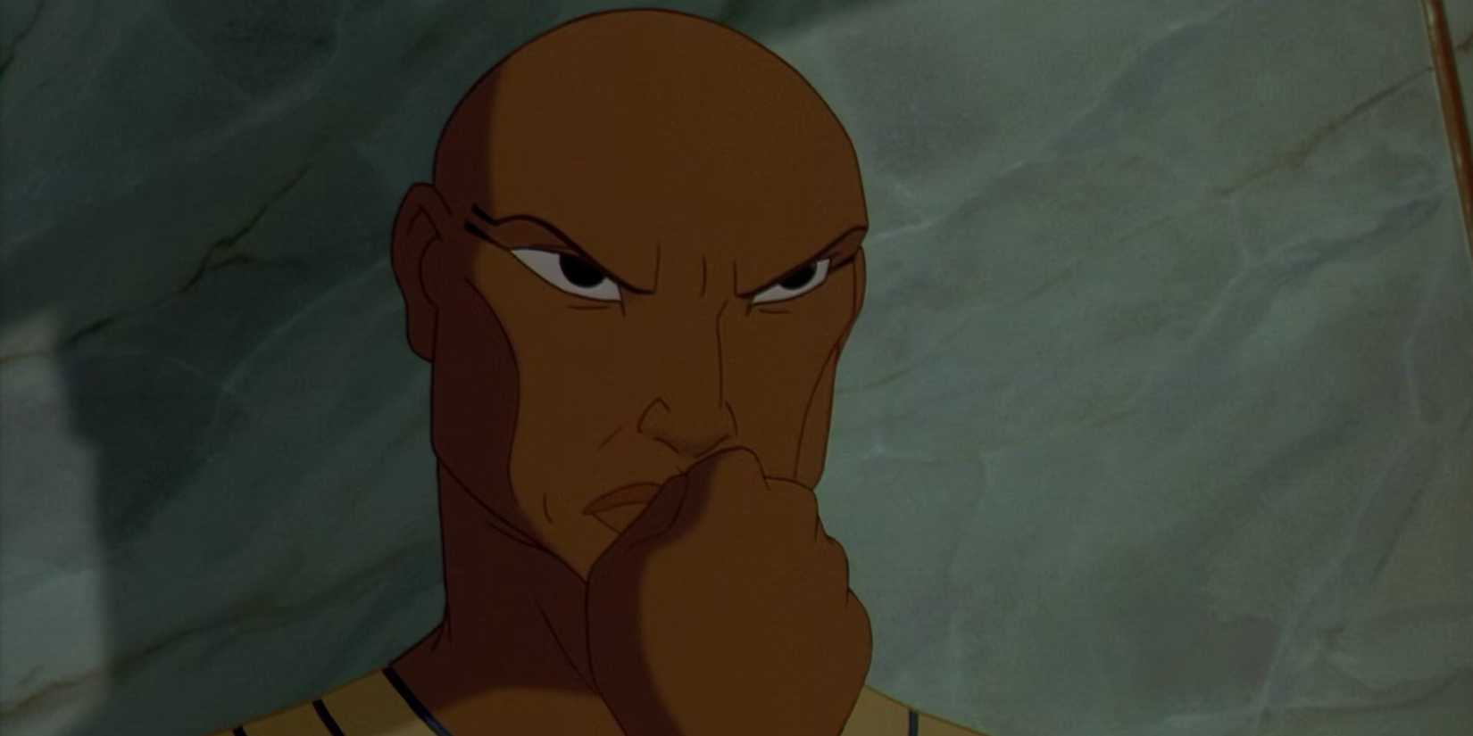Rameses, voiced by Ralph Fiennes, stares ahead angrily with a clenched fist in The Prince of Egypt.