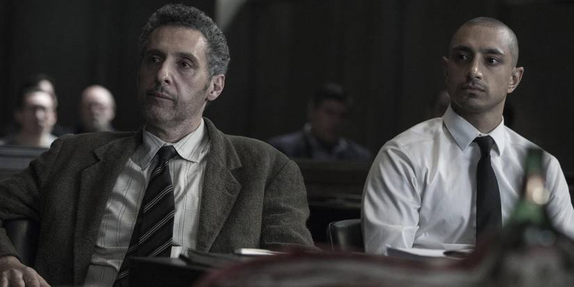 John Turturro and Riz Ahmed as John Stone and Nasir 'Naz' Khan, sitting in court in The Night Of.