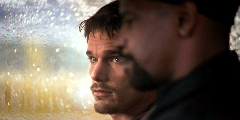 Denzel Washington and Ethan Hawke sit in the car while it rains outside in Training Day