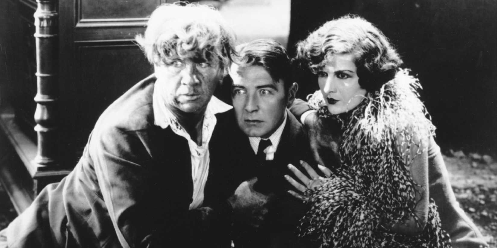 Evelyn Brent, George Bancroft, and Clive Brook in 'Underworld' (1927), looking seriously ahead