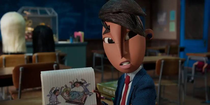 Raul Cocoltl showing off one of his drawings