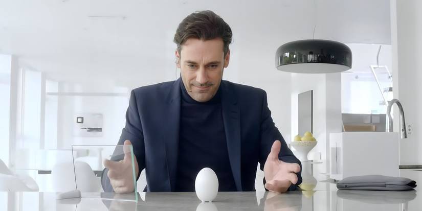 Jon Hamm as Matt Trent in Black Mirror White Christmas looking at the camera depressed.