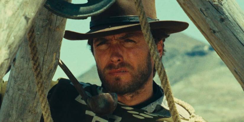 Clint Eastwood looks into the distance as Man With No Name in A Fistful of Dollars