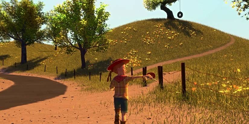 Jessie's owner, Emily, holding Jessie (voiced by Joan Cusack) and running through a sunny field in Toy Story 2