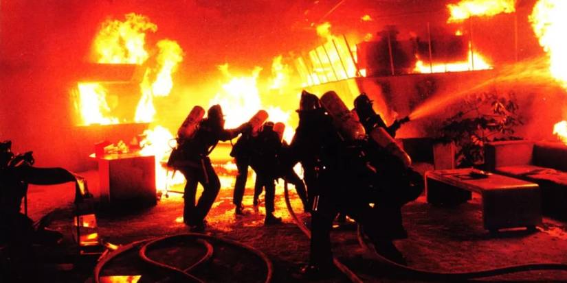 Firefighters try to contain an out-of-control fire in 'The Towering Inferno'