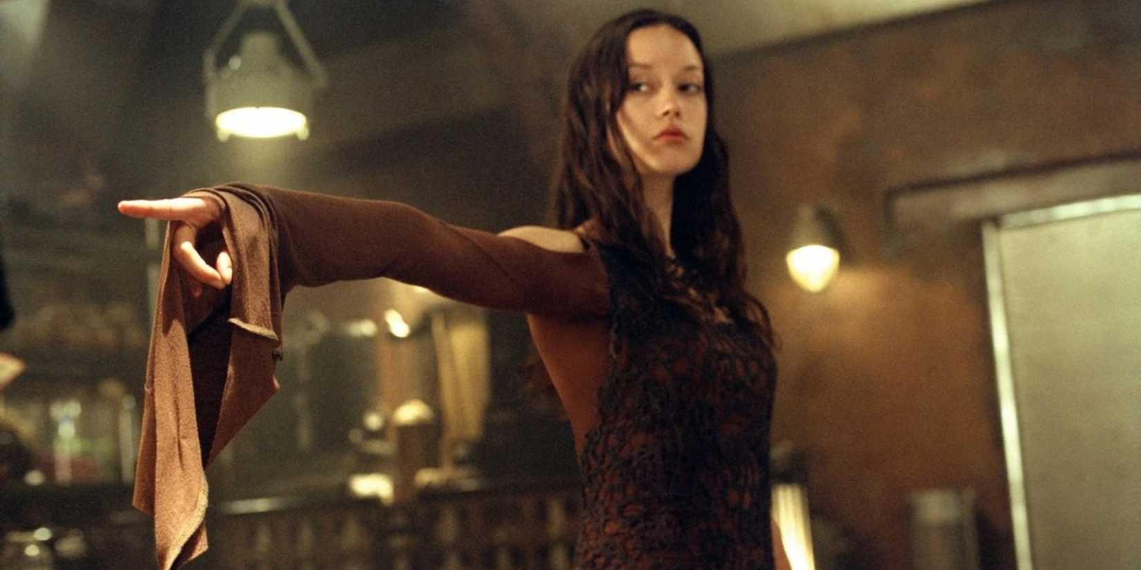 River (Summer Glau) pointing to someone off camera in 'Firefly.'