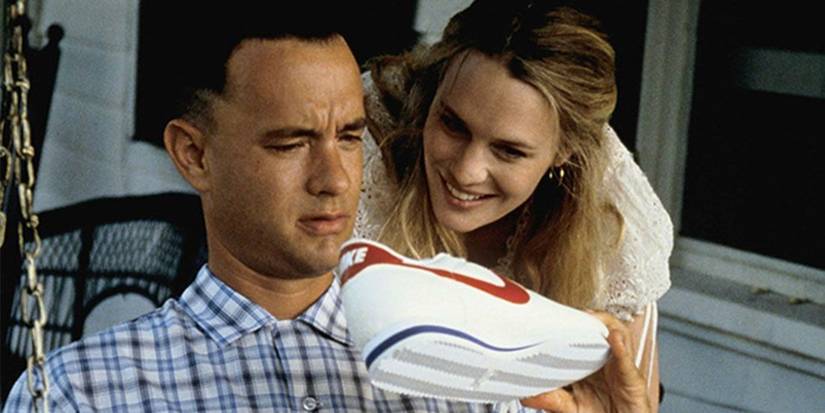 Forrest Gump holding his new pair of Nike sneakers up next to Jenny in Forrest Gump.
