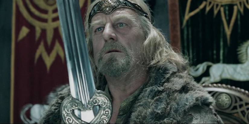 Theoden gazes upon his sword, Herugrim.