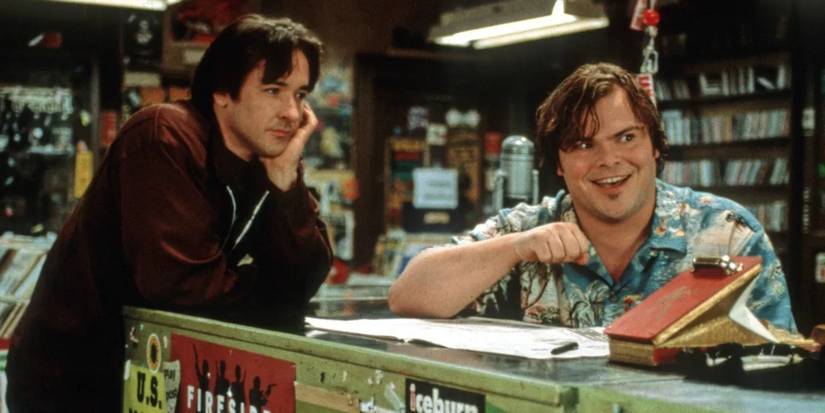 Jack Black and John Cusack hanging at the record shop counter in High Fidelity.