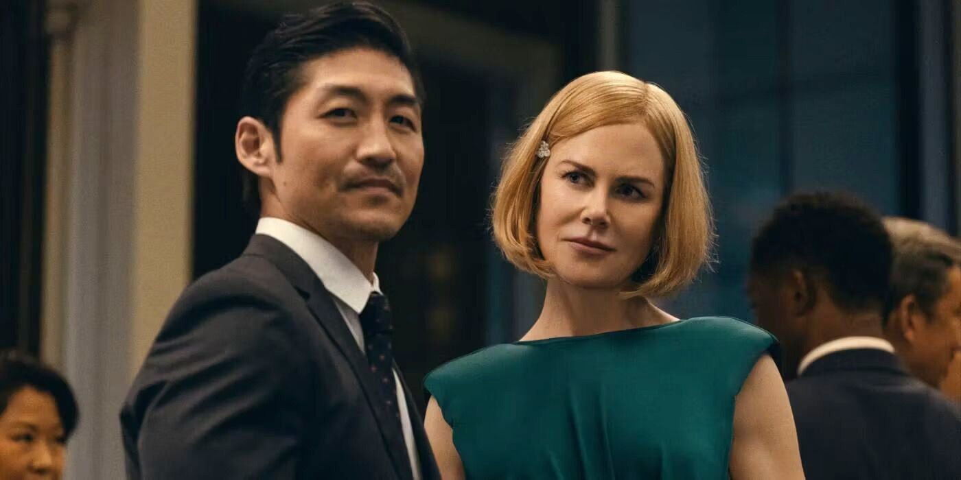 Clarke (Brian Tee) and Margaret (Nicole Kidman) at a party in Expats