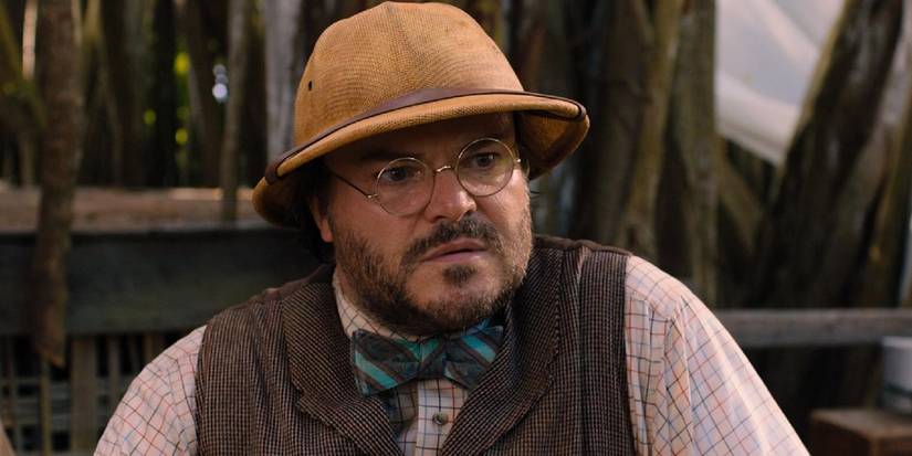 Jack Black as Professor Sheldon "Shelly" Oberon looking somber in Jumanji: Welcome to the Jungle.