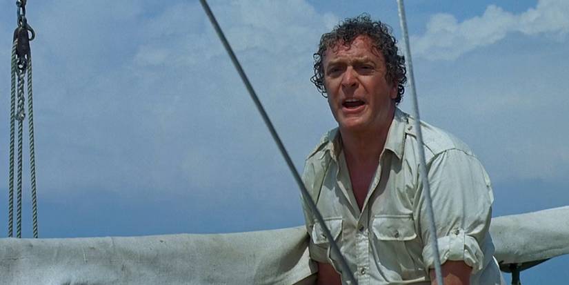 Hoagie Newcombe (Michael Caine) looking stressed on a boat in 'Jaws: The Revenge'
