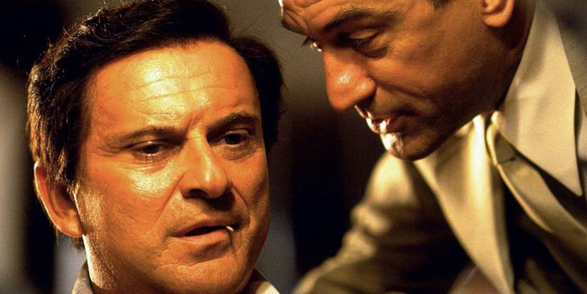 Ace (Robert De Niro) says something concerning into Nicky Santoro's (Joe Pesci) ear in Casino