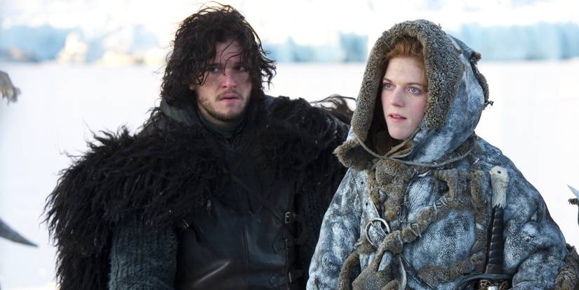 Jon Snow of the Night's Watch stands in the snow as Ygritte's captive in Game of Thrones.