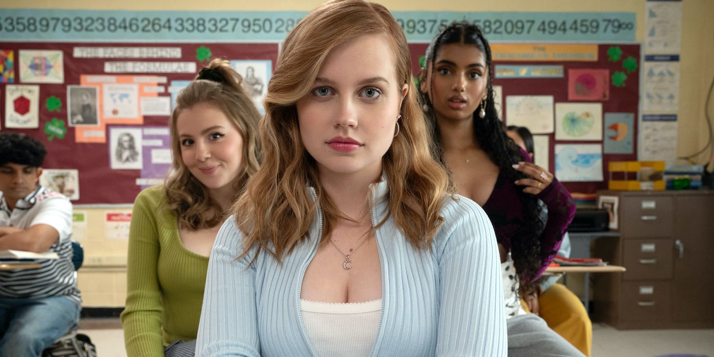  Cady sitting at her desk in class with Gretchen Karen in the background in Mean Girls