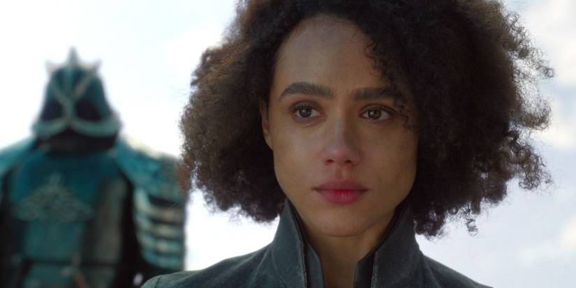 Nathalie Emmanuel as Missandei in Game of Thrones staring intently ahead.