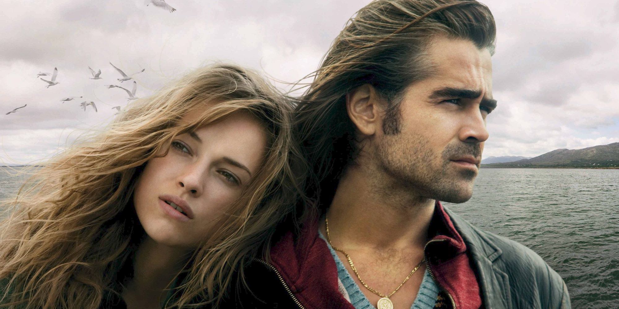 Ondine resting her head in Syracuse's shoulder while he looks to the distance in the film Ondine.