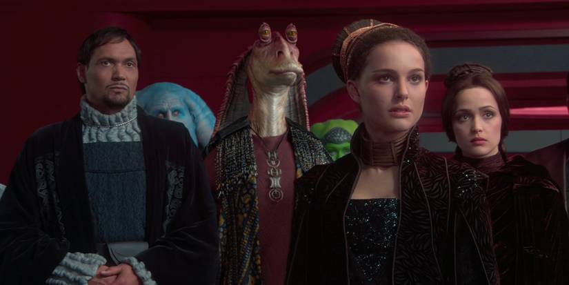 Jar Jar Binks (Ahmed Best), Senator Organa (Jimmy Smits), and Padme Amidala (Natalie Portman) look to plead their case in the senate in Star Wars
