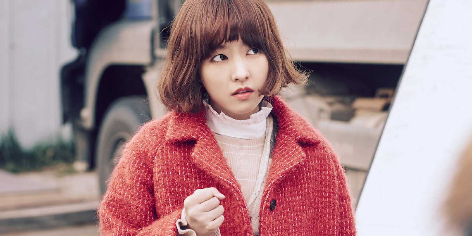 A shot of Park Bo Young clenching her fist in Strong Woman Do Bong Soon.