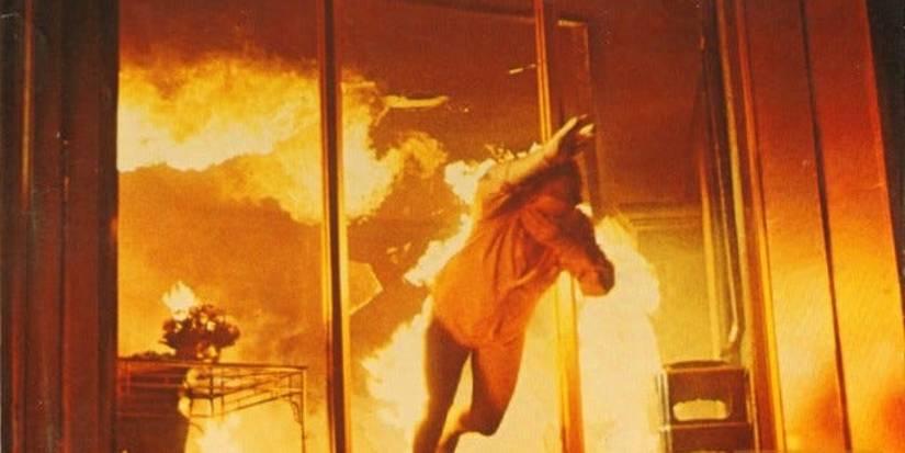 Partygoer, on fire, jumps out of the window in 'The Towering Inferno'