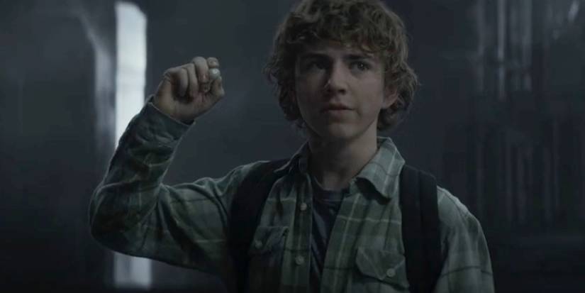 Percy (Walker Scobell) with a magical pearl in Percy Jackson and the Olympians