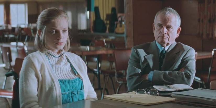 Mitchell Stephens looking at Nicole while she talks absent-mindedly in The Sweet Hereafter