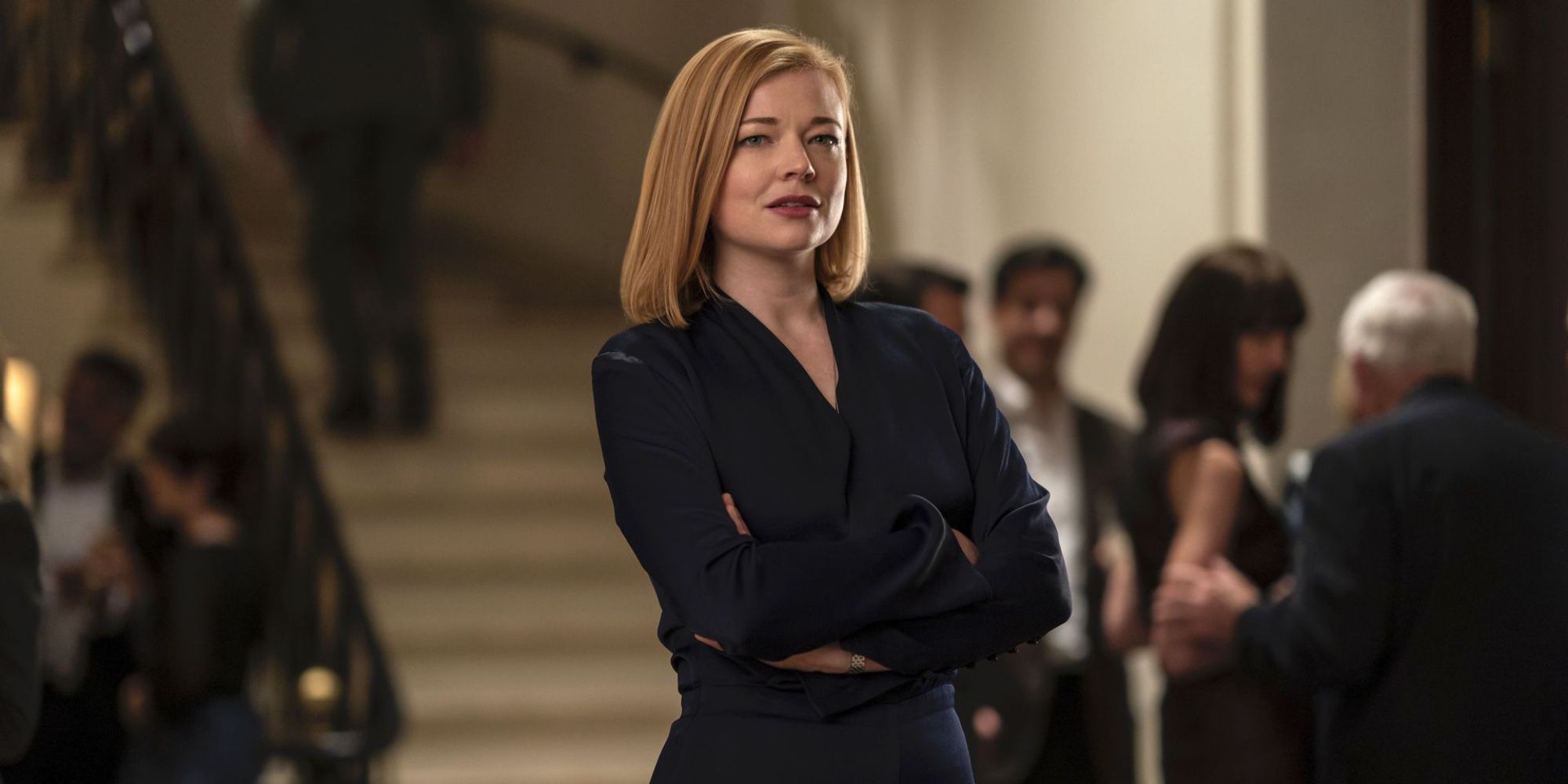 Sarah Snook crossing her arms in Succession.