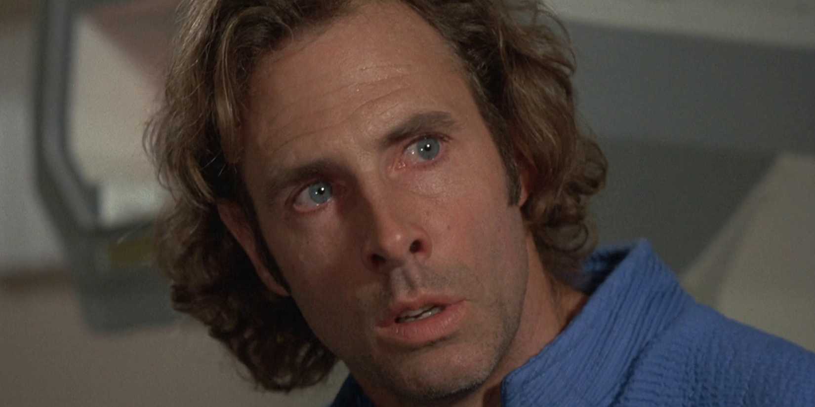 Bruce Dern as Freeman Lowell looking back at a person offscreen in Silent Running