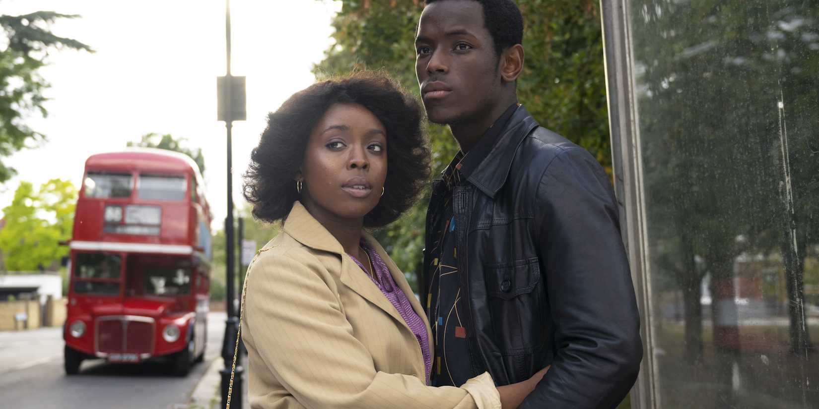 Franklyn and Martha on the street looking in the same direciton in Small Axe: Lovers Rock