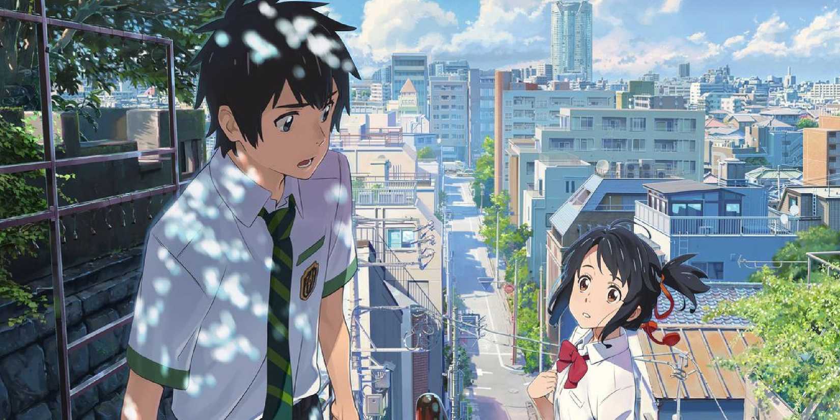 Taki and Mitsuha looking at each other with a worried expression in Your Name.