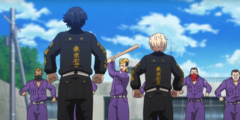 Two Toman gang members rushing toward an opposing gang in Tokyo Revengers