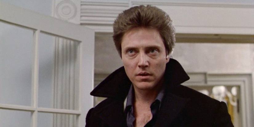 The Dead Zone starring Christopher Walken in a high collared coat looking at something 
