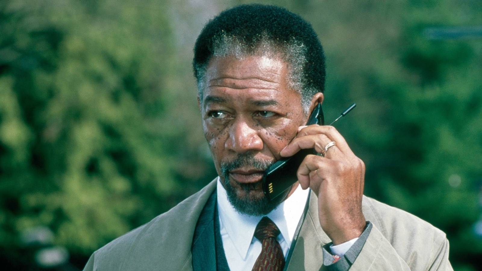 Alex Cross, played by actor Morgan Freeman, talking on a cellphone in Along Came a Spider
