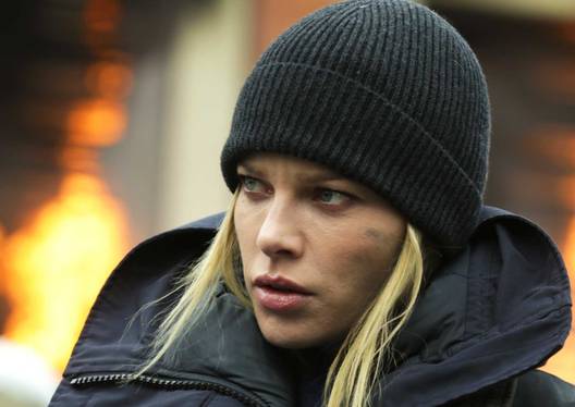 A firefighter with a hat on