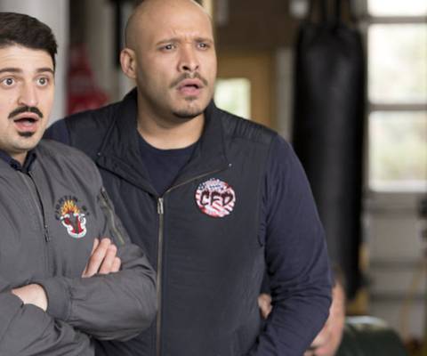 Two firefighters looking shocked